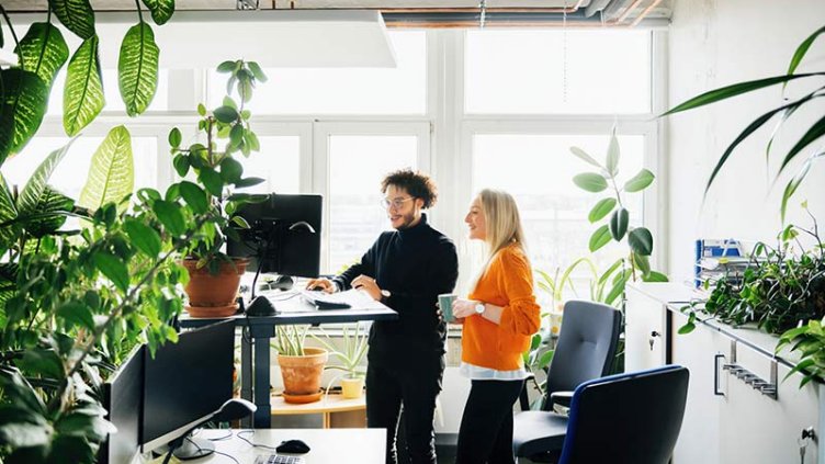 People working in the office space