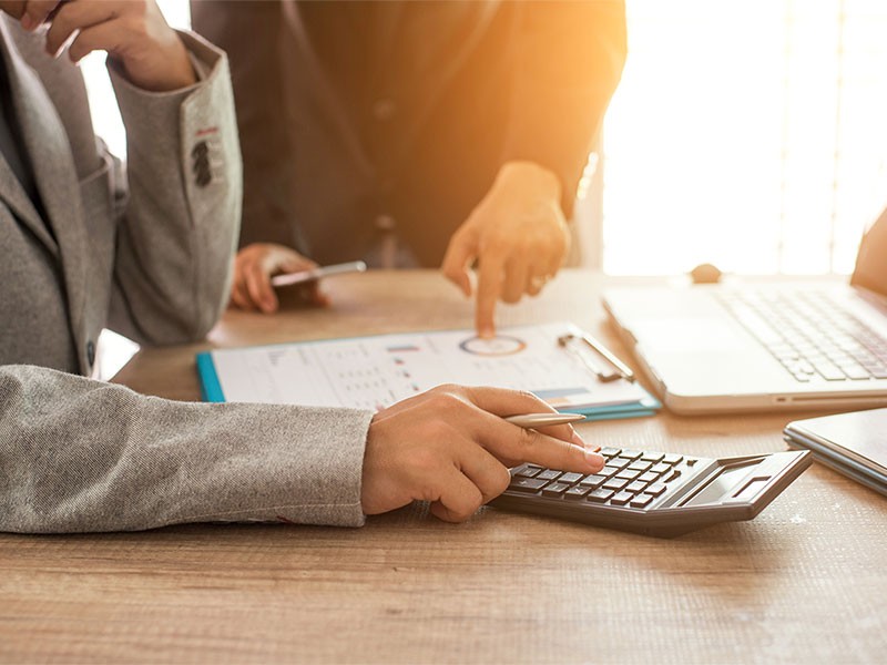 A person reviewing financial documents